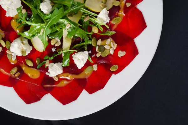 Fresh beetroot carpaccio on plate — Stock Photo, Image