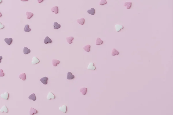 Cukor szívét a rózsaszín háttér — Stock Fotó