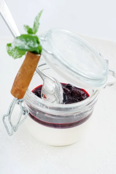 Dessert with berries in a jar — Stock Photo, Image
