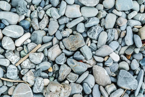 Gray pebbles op het strand — Stockfoto