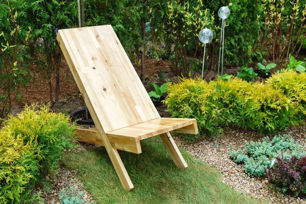 Wooden chair in the garden — Stock Photo, Image