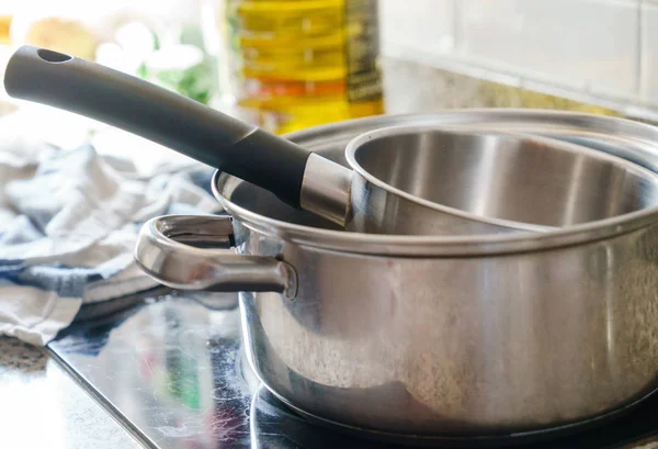 kitchen. saucepans and oil