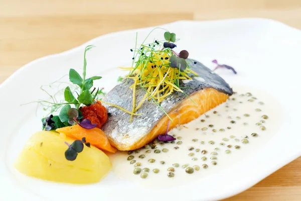 Roasted salmon on plate — Stock Photo, Image