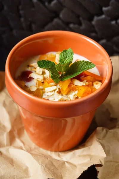 Healthy breakfast in pot — Stock Photo, Image