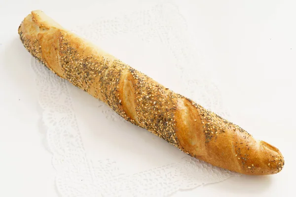 Fresh baguette on white — Stock Photo, Image