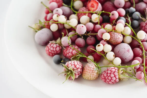 Frozen berries on plate — Stock Photo, Image