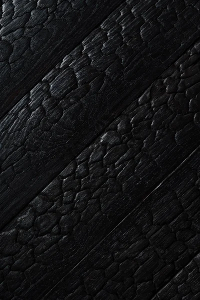 Siyah ahşap doku yanmış