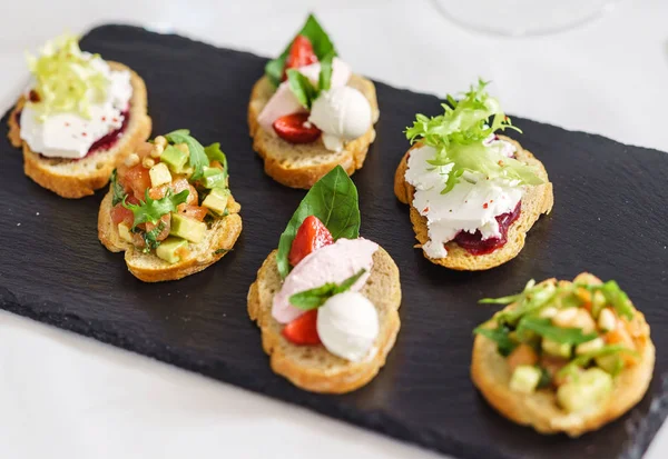 Different kinds of canapes — Stock Photo, Image