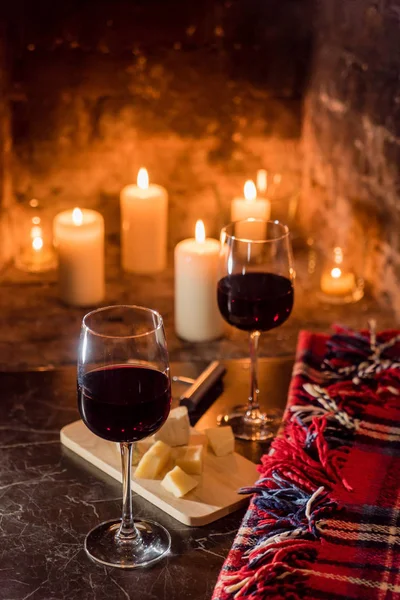 wine and candles on table