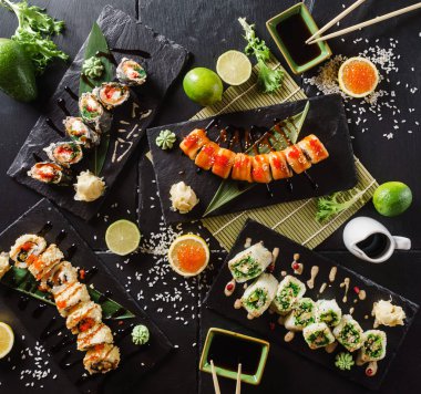 fresh made sushi with soy sauce clipart