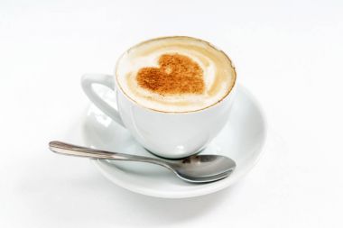 Latte sanat üzerine beyaz Kupası, yakın çekim