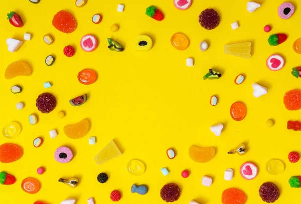 Colorful Candies Yellow Background — Stock Photo, Image