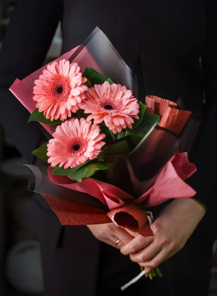 nice bouquet in the hands of woman