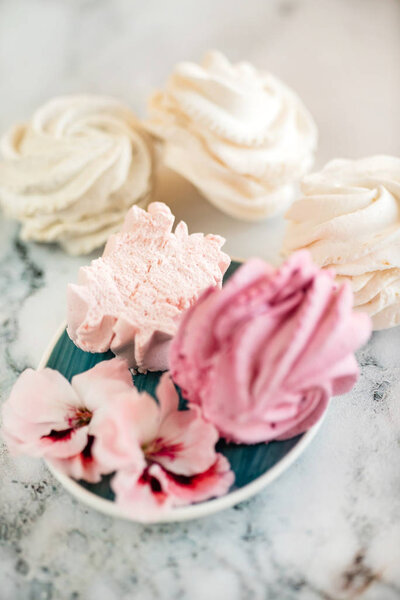 Beautiful delicious dessert. Zephyr in the shape of flowers roses. 