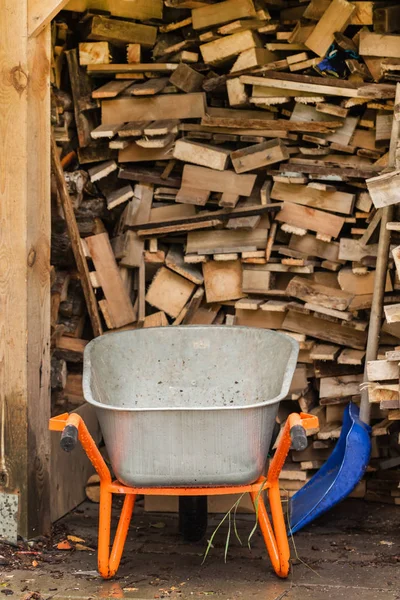 Pile Wood Logs Wheelbarrow — Stock Photo, Image