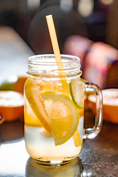 fresh lemonade with herbs and fruits