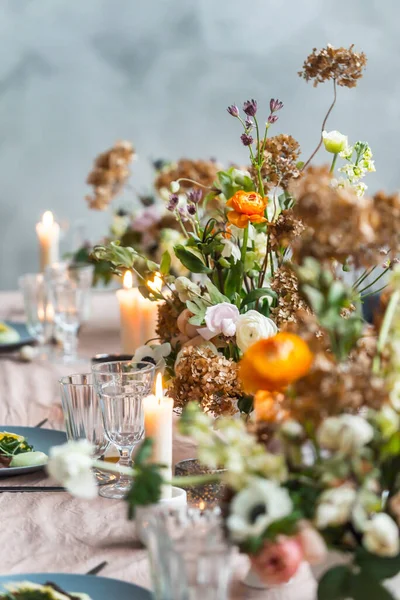 Easter table with candles and flowers