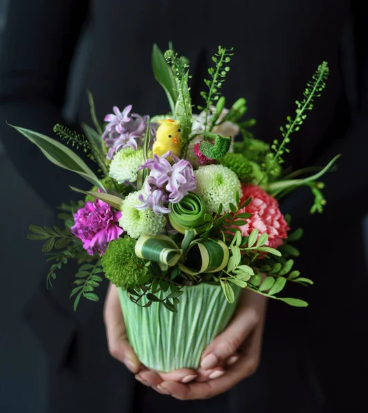 nice bouquet in the hands of woman
