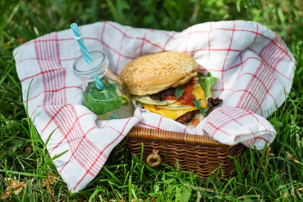 picnic in the park - burger and fresh lemonade