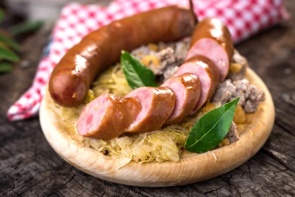 Sausages with buckwheat mush — Stock Photo, Image