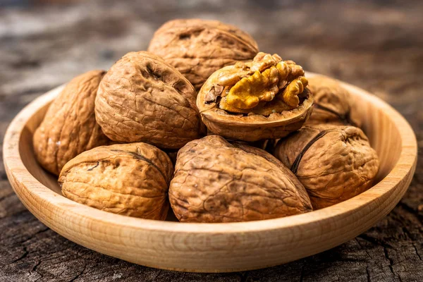 Walnuts on wooden table — Stock Photo, Image