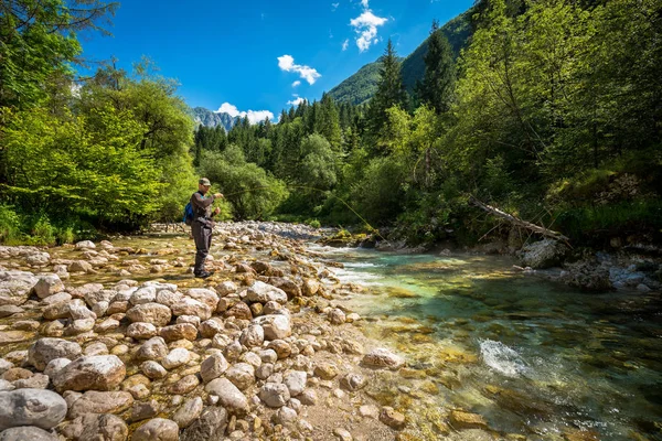 Fly fisherman in mountains — Stock Photo, Image