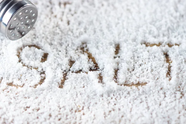 Salt on wooden background — Stock Photo, Image