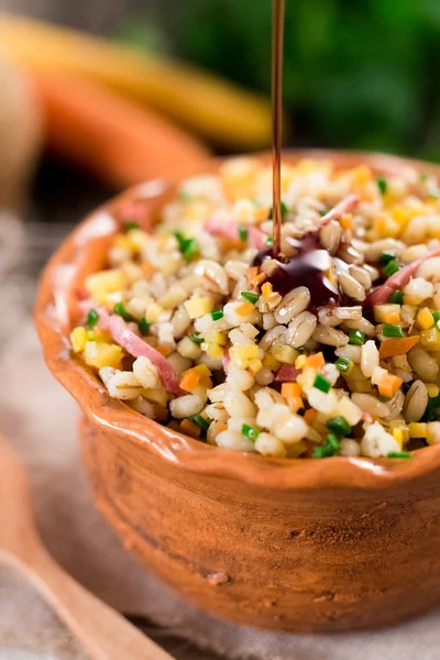 Barley salad with pumpkin seed oil — Stock Photo, Image