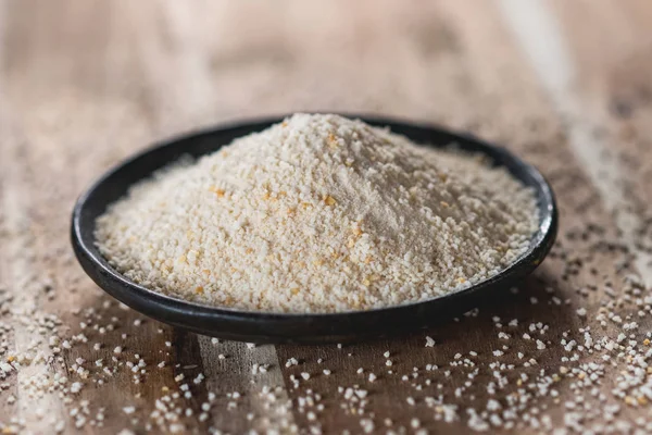 Bread Crumbs Black Plate Wooden Table — Stock Photo, Image