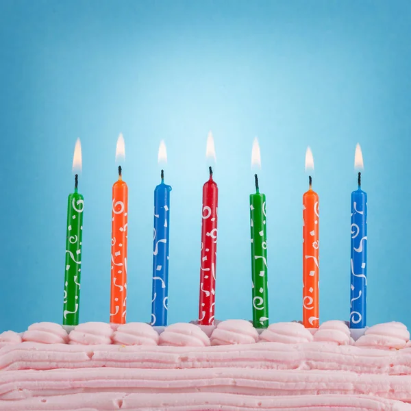 Birthday candles on blue background — Stock Photo, Image