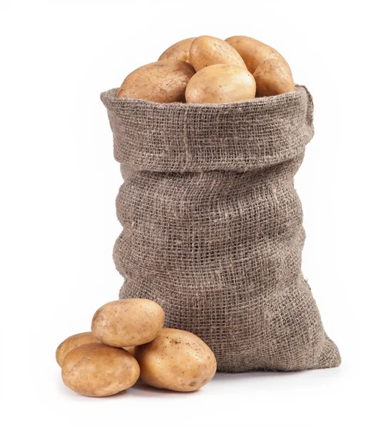 Patatas en la bolsa aisladas sobre fondo blanco — Foto de Stock