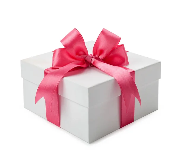 Белая подарочная коробка с розовым бантом — стоковое фото