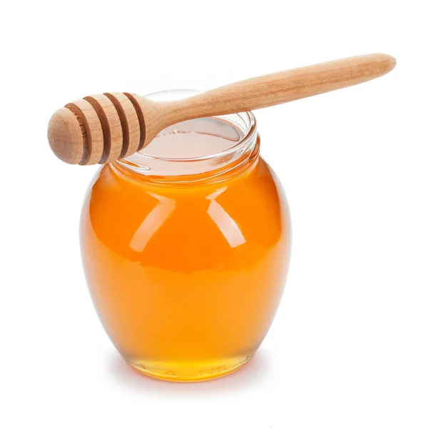 Honey with wooden drizzler on white background — Stock Photo, Image