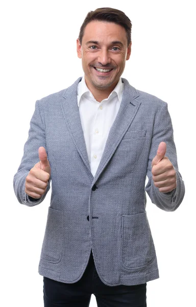 Knappe glimlachend guy gebaren duimen omhoog. Geïsoleerd — Stockfoto