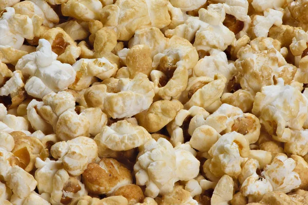 Macro van popcorn achtergrond bovenaanzicht — Stockfoto