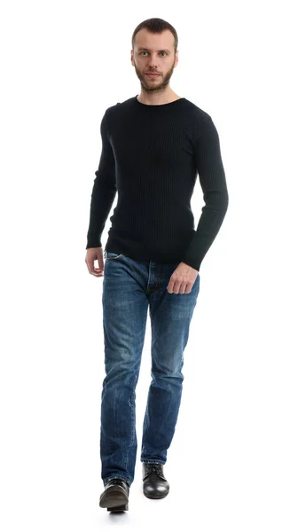 Full length portrait of a casual young man walking — Stock Photo, Image