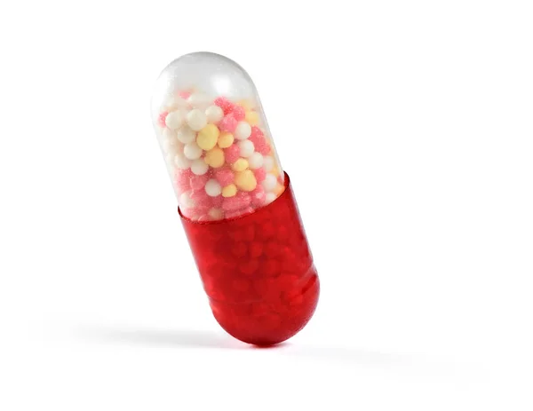 Macro d'une capsule médicale rouge isolée — Photo