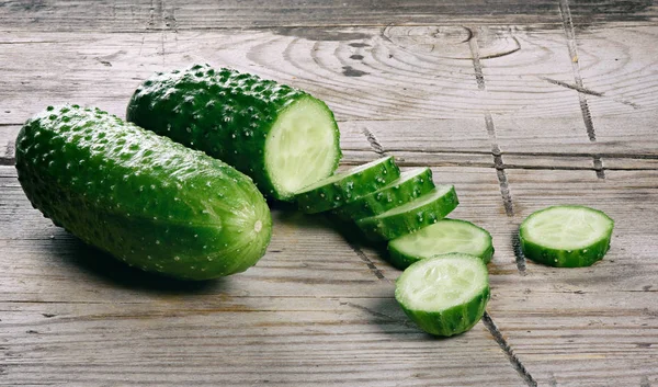 Cucumber on rustic wooden background. — Stock Photo, Image