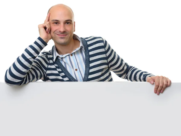 Jovem casual cara com cartaz em branco — Fotografia de Stock