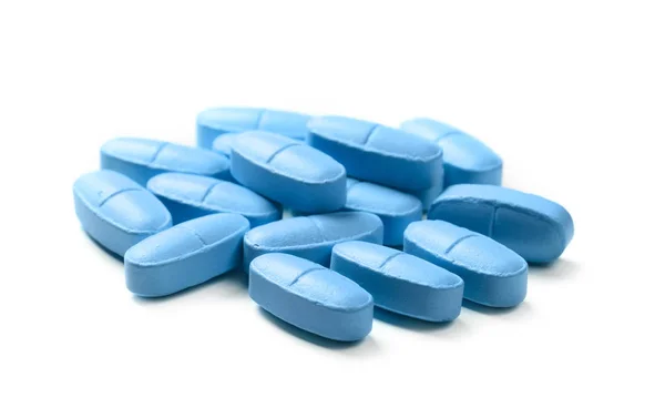 Blauwe pillen witte achtergrond — Stockfoto