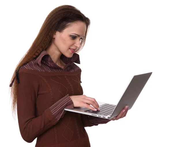 Menina bonita trabalhando em um computador portátil. Isolados — Fotografia de Stock