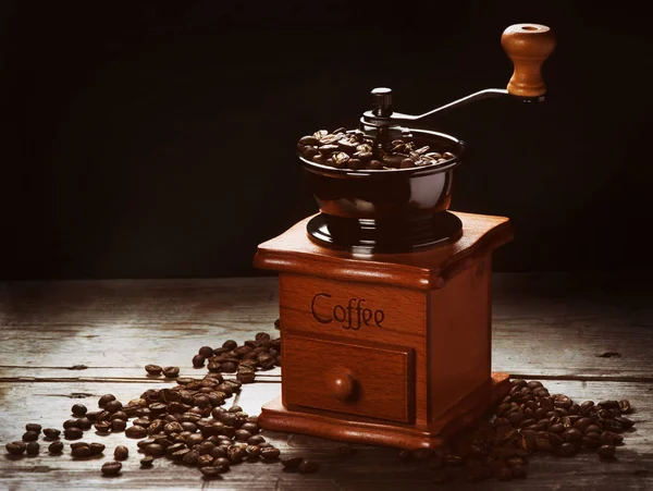 Coffee grinder on a wooden desk — Stock Photo, Image