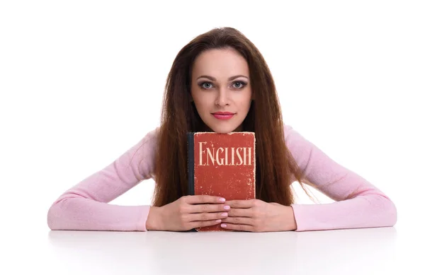 Bonita mujer sosteniendo un diccionario Inglés —  Fotos de Stock