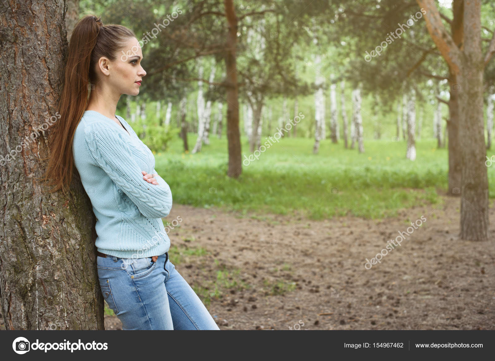 Young woman enjoying her time outside in park — Stock Photo © spaxiax