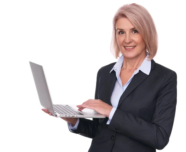 Beautiful senior businesswoman with laptop — Stock Photo, Image