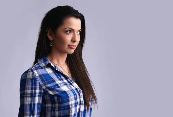 Beautiful brunette woman looking away. Isolated — Stock Photo, Image