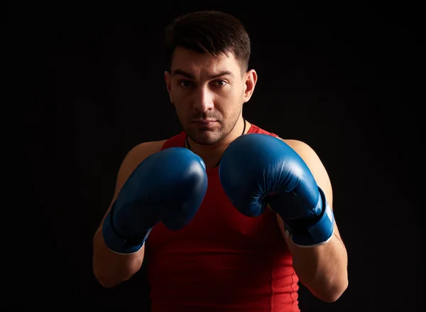 Man in boxing gloves Stock Photo