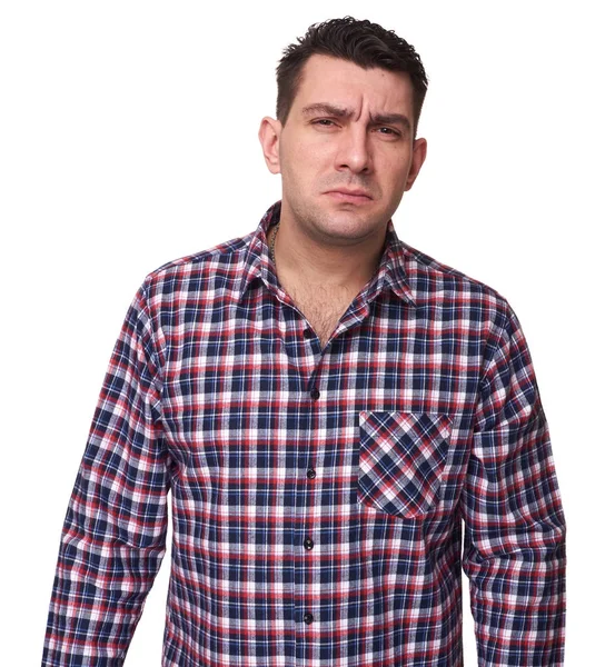 Poważny człowiek w plaid shirt. Na białym tle — Zdjęcie stockowe