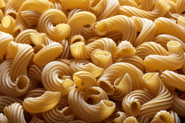 Suchy makaron włoski Cavatappi tekstur — Zdjęcie stockowe