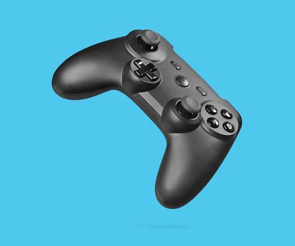 Controller di gioco isolato su sfondo blu — Foto Stock